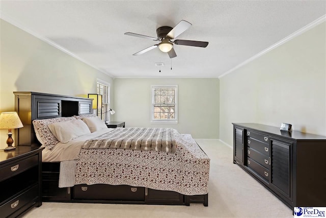 bedroom with light colored carpet, visible vents, ornamental molding, a ceiling fan, and baseboards