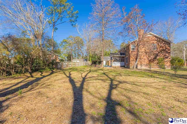 view of yard with fence