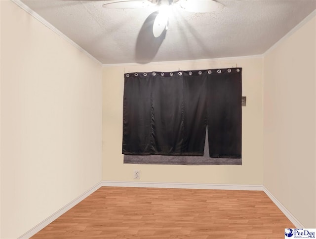 515 W Darlington St, Florence, SC 29501 - unfurnished room with a textured ceiling, wood finished floors, and ceiling fan