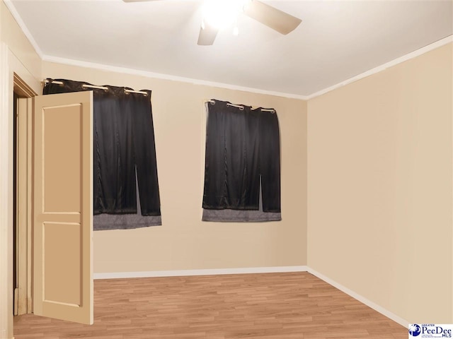 515 W Darlington St, Florence, SC 29501 - spare room featuring light wood-style flooring, ceiling fan, and ornamental molding
