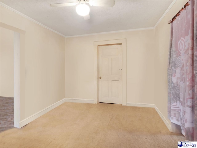 515 W Darlington St, Florence, SC 29501 - unfurnished room featuring baseboards, light colored carpet, ceiling fan, and crown molding