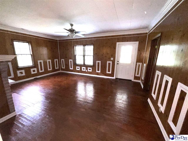 251 Papermill Rd, Florence, SC 29506 - unfurnished living room with a ceiling fan, crown molding, wood finished floors, and baseboards
