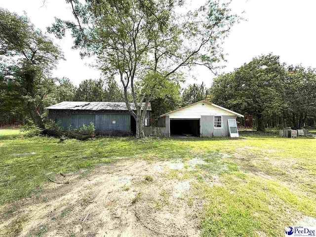 251 Papermill Rd, Florence, SC 29506 - view of pole building featuring a lawn