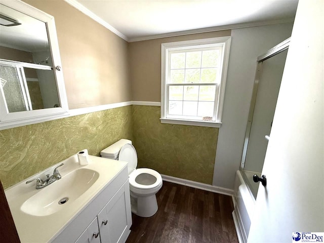 251 Papermill Rd, Florence, SC 29506 - bathroom featuring wood finished floors, vanity, toilet, crown molding, and baseboards