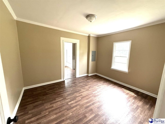 251 Papermill Rd, Florence, SC 29506 - empty room featuring crown molding, dark wood finished floors, baseboards, and electric panel