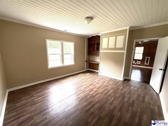 251 Papermill Rd, Florence, SC 29506 - empty room with crown molding, dark wood-style flooring, baseboards, and wooden ceiling