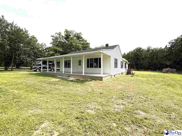 251 Papermill Rd, Florence, SC 29506 - view of front of house with a front yard and a porch
