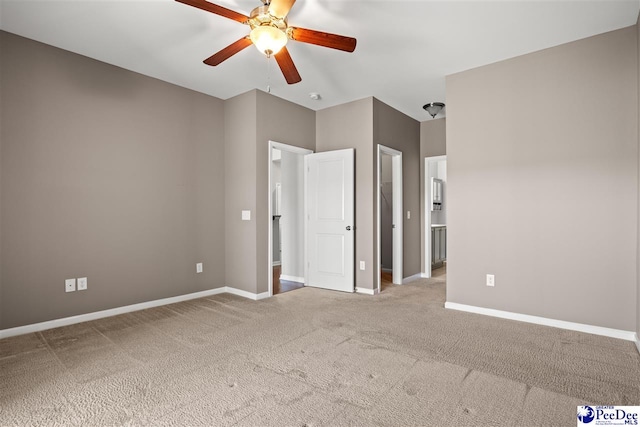 121 Parmelee Dr, Murrells Inlet, SC 29576 - unfurnished bedroom with carpet, a spacious closet, and a ceiling fan
