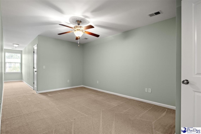 121 Parmelee Dr, Murrells Inlet, SC 29576 - spare room featuring a ceiling fan and light colored carpet