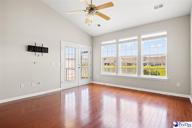 121 Parmelee Dr, Murrells Inlet, SC 29576 - empty room with plenty of natural light, wood finished floors, ceiling fan, and high vaulted ceiling