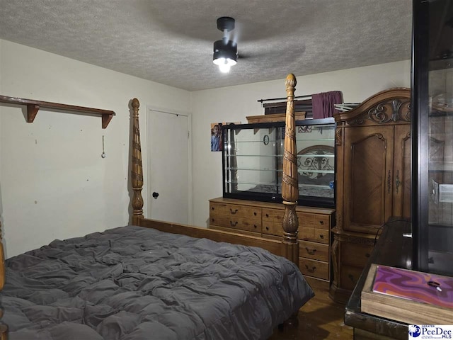 2351 Millers Rd, Mullins, SC 29574 - bedroom with a textured ceiling, dark wood finished floors, and a ceiling fan
