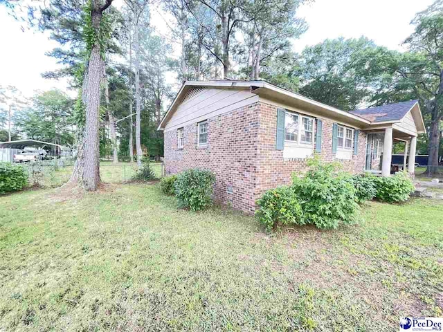 2990 Shadeland Cir, Florence, SC 29501 - view of home's exterior featuring brick siding
