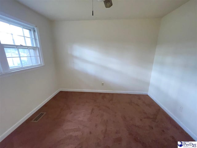 2990 Shadeland Cir, Florence, SC 29501 - unfurnished room featuring baseboards, carpet, and a ceiling fan