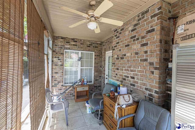 view of patio featuring ceiling fan