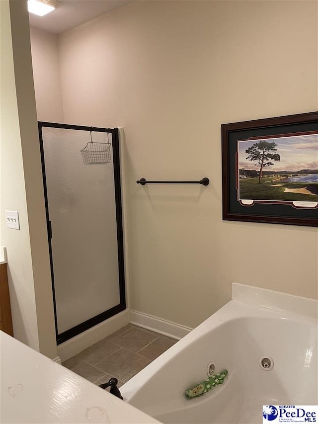 bathroom with vanity, plus walk in shower, and tile patterned flooring