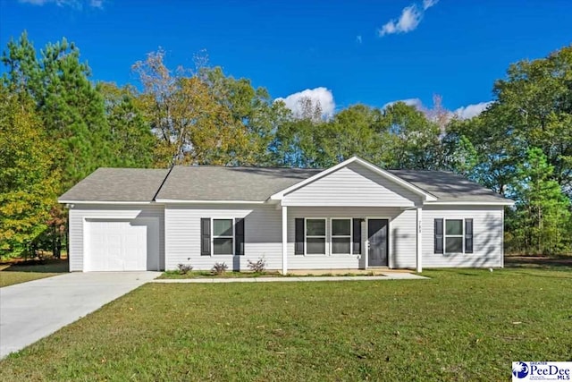 single story home with a garage and a front lawn