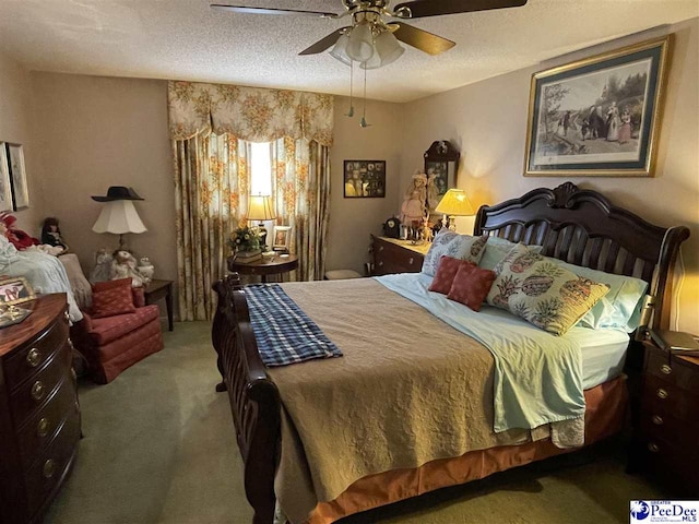 bedroom featuring ceiling fan, carpet flooring, and a textured ceiling