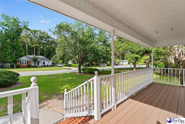 2348 Chadwick Dr, Florence, SC 29501 - porch with a yard and view of wooded area