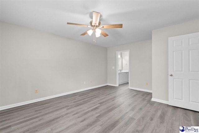 2348 Chadwick Dr, Florence, SC 29501 - unfurnished bedroom with wood finished floors, ensuite bathroom, and a ceiling fan