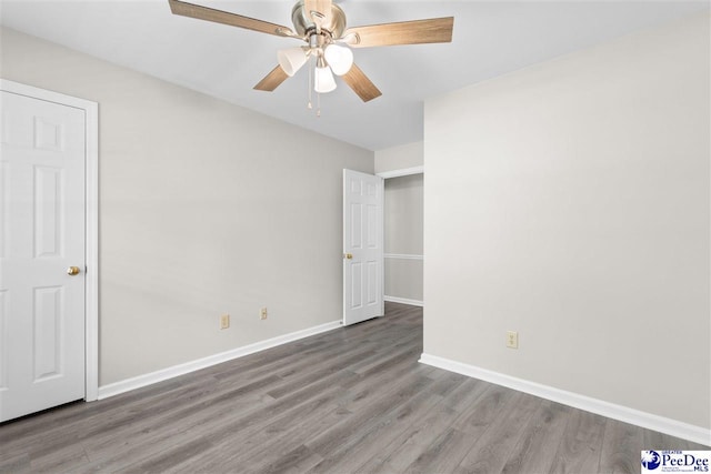 2348 Chadwick Dr, Florence, SC 29501 - unfurnished bedroom featuring wood finished floors and a ceiling fan
