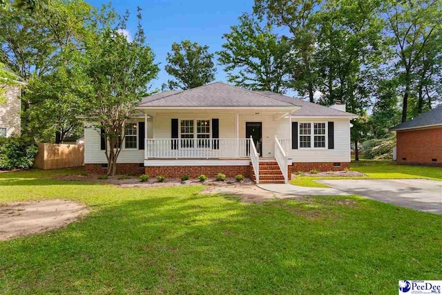 2348 Chadwick Dr, Florence, SC 29501 - view of front of home with covered porch, crawl space, and a chimney