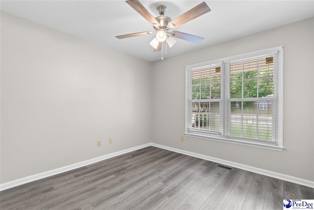2348 Chadwick Dr, Florence, SC 29501 - empty room featuring wood finished floors and a ceiling fan