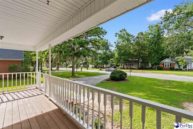 2348 Chadwick Dr, Florence, SC 29501 - wooden porch featuring a yard