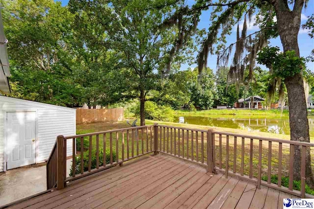 2348 Chadwick Dr, Florence, SC 29501 - wooden deck with a water view and view of wooded area