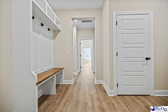 87 Kings Rd, Quinby, SC 29506 - mudroom with visible vents, light wood-style flooring, and baseboards