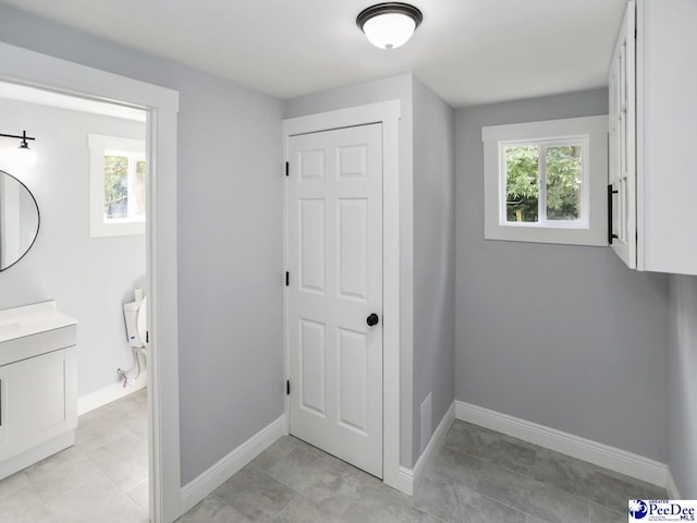 906 Gladstone St, Florence, SC 29501 - bathroom featuring vanity and baseboards