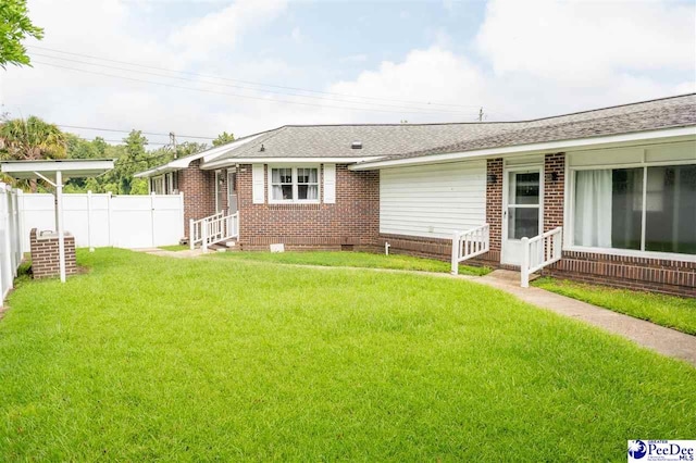 view of front of home with a front yard