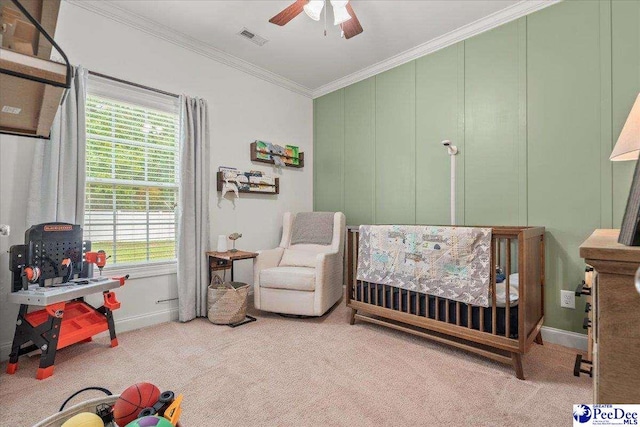 3471 Sweetgrass Dr, Florence, SC 29501 - carpeted bedroom featuring ornamental molding, a nursery area, baseboards, and ceiling fan