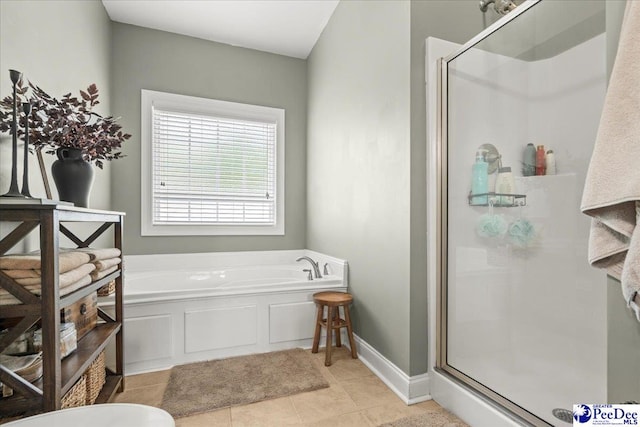 3471 Sweetgrass Dr, Florence, SC 29501 - full bath with a stall shower, a bath, tile patterned floors, and baseboards