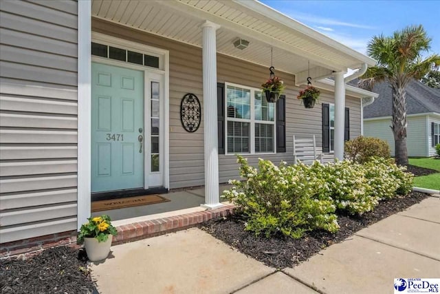 3471 Sweetgrass Dr, Florence, SC 29501 - doorway to property featuring a porch