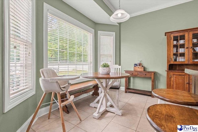 3471 Sweetgrass Dr, Florence, SC 29501 - dining room with crown molding, baseboards, and light tile patterned floors