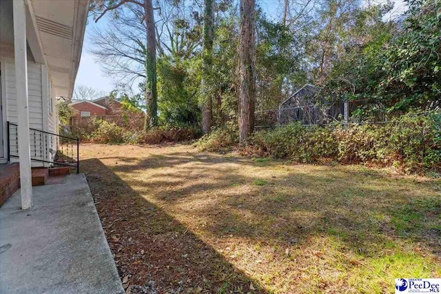 view of yard featuring fence