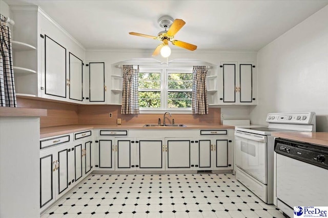 kitchen with white appliances, open shelves, a sink, and light countertops