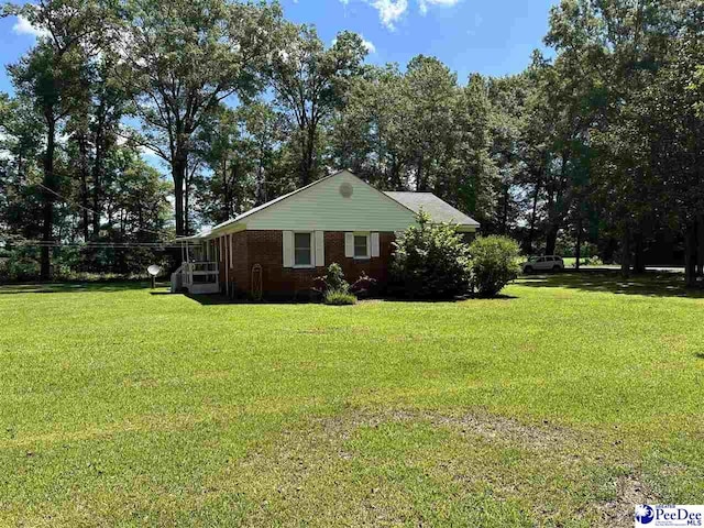 view of home's exterior featuring a lawn