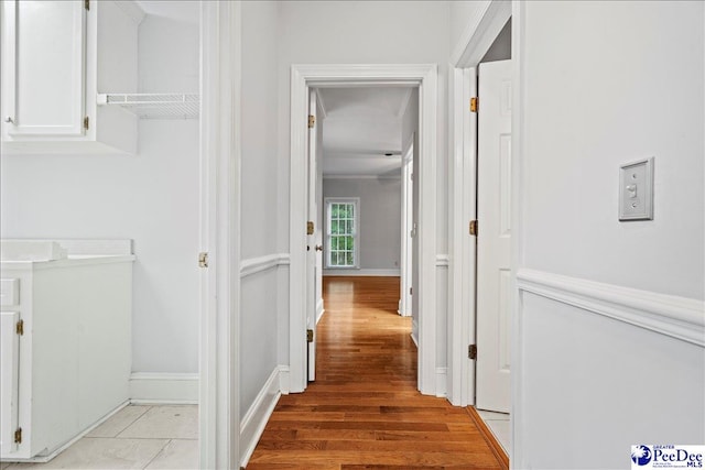 corridor featuring light hardwood / wood-style floors