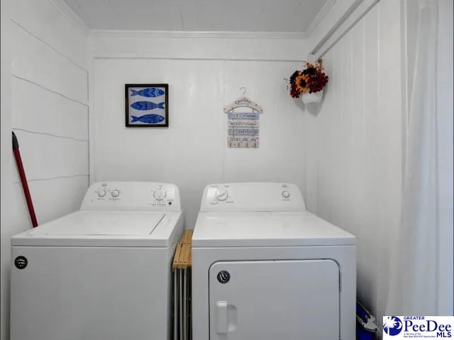 1417 Woods Rd, Florence, SC 29501 - washroom featuring washing machine and dryer and crown molding