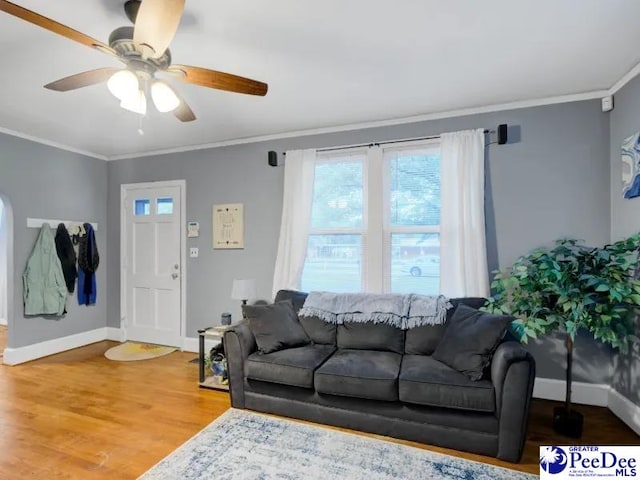 1417 Woods Rd, Florence, SC 29501 - living room with crown molding, wood finished floors, and ceiling fan