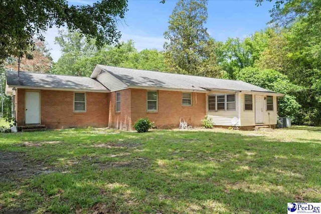 3712 E Hoyt St, Florence, SC 29506 - view of front of property featuring a front lawn and brick siding