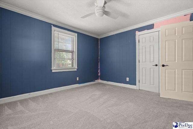 3712 E Hoyt St, Florence, SC 29506 - unfurnished room with crown molding, a ceiling fan, carpet flooring, and a textured ceiling