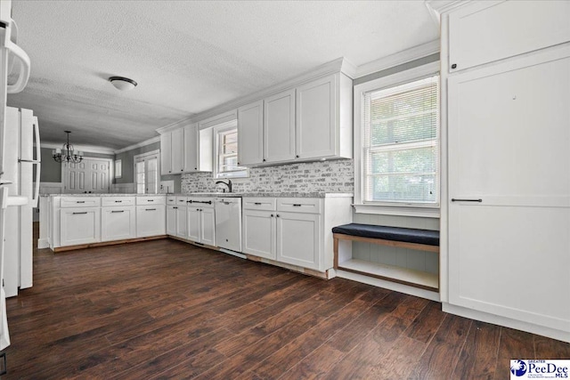 3712 E Hoyt St, Florence, SC 29506 - kitchen featuring dishwasher, dark wood-style floors, crown molding, a peninsula, and a chandelier