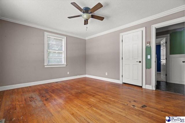 3712 E Hoyt St, Florence, SC 29506 - empty room with ceiling fan, hardwood / wood-style floors, a textured ceiling, and crown molding