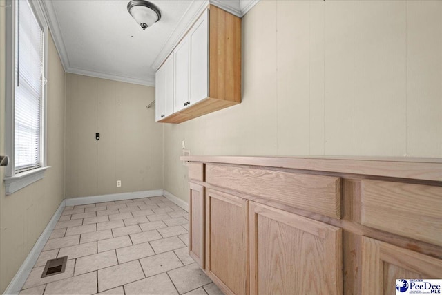 3712 E Hoyt St, Florence, SC 29506 - laundry room with crown molding, hookup for an electric dryer, and light tile patterned flooring