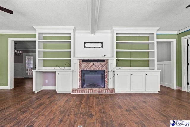 3712 E Hoyt St, Florence, SC 29506 - unfurnished living room featuring a textured ceiling, crown molding, a brick fireplace, dark wood finished floors, and a chandelier