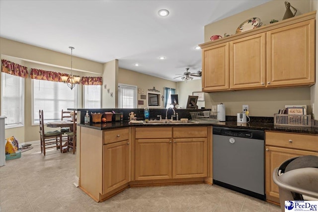kitchen with sink, hanging light fixtures, stainless steel dishwasher, kitchen peninsula, and ceiling fan with notable chandelier