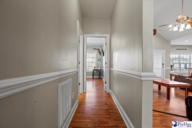1416 Nottingham Dr, Hartsville, SC 29550 - corridor featuring a healthy amount of sunlight, dark hardwood / wood-style floors, and high vaulted ceiling