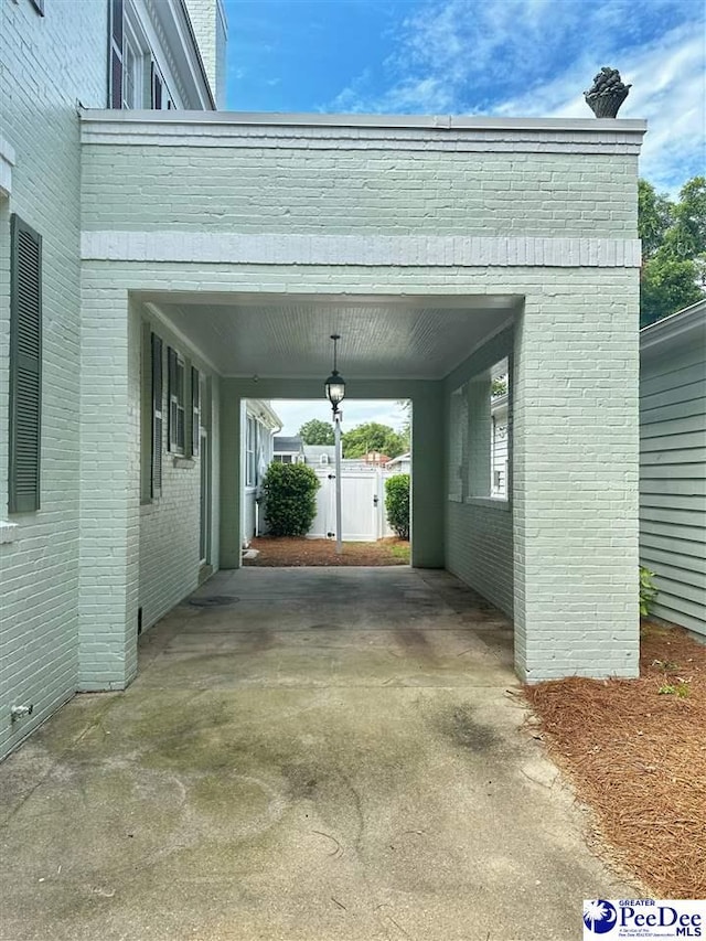 view of parking with a carport